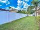 Backyard with a vinyl fence at 4426 Brandon Ridge Dr, Valrico, FL 33594