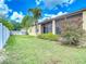Landscaped backyard featuring a well-maintained lawn at 4426 Brandon Ridge Dr, Valrico, FL 33594