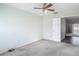 Empty bedroom with ceiling fan and access to the rest of the home at 4426 Brandon Ridge Dr, Valrico, FL 33594