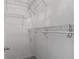 Empty closet featuring wire shelving and gray flooring at 4426 Brandon Ridge Dr, Valrico, FL 33594