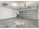 Spacious two-car garage with overhead door opener, electrical, and ample room for parking and storage at 4426 Brandon Ridge Dr, Valrico, FL 33594