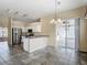 Modern kitchen features stainless steel appliances, ample counter space, and natural light at 4426 Brandon Ridge Dr, Valrico, FL 33594
