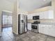 Well-equipped kitchen with stainless steel appliances and plenty of counter space at 4426 Brandon Ridge Dr, Valrico, FL 33594