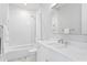 Bathroom featuring a tub and shower combination with white subway tile at 4614 W Lowell Ave, Tampa, FL 33629