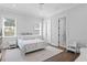 Cozy bedroom with a comfortable bed and plenty of natural light at 4614 W Lowell Ave, Tampa, FL 33629