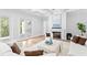 Bright open living space features detailed ceiling, fireplace, and access to the backyard at 4614 W Lowell Ave, Tampa, FL 33629