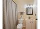 Cozy bathroom with a shower, vanity, modern lighting, and neutral colors for a relaxing atmosphere at 5404 Garden Arbor Dr, Lutz, FL 33558