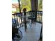 Inviting balcony area, furnished with a cozy dining table and chairs at 5553 Baywater Dr, Tampa, FL 33615
