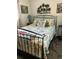 Beautifully decorated bedroom with stylish furniture, bright decor, and an accent rug at 5553 Baywater Dr, Tampa, FL 33615