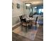 Charming dining area with stylish table setting and decorative mirrored wall at 5553 Baywater Dr, Tampa, FL 33615