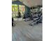 Community fitness center with modern cardio equipment and ample natural light at 5553 Baywater Dr, Tampa, FL 33615