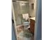 Clean bathroom features a shower with glass doors, a toilet, and a vanity with sink at 5553 Baywater Dr, Tampa, FL 33615