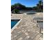 Community hot tub next to the community pool with comfortable seating at 5553 Baywater Dr, Tampa, FL 33615