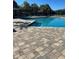 Relaxing community pool and sunbathing deck at 5553 Baywater Dr Dr # 121, Tampa, FL 33615