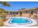 Private swimming pool surrounded by a patio, offering a serene retreat at 5601 4Th S St, St Petersburg, FL 33705