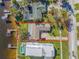 Aerial view of luxury home featuring manicured yard and waterfront access at 6151 Bayou Grande Ne Blvd, St Petersburg, FL 33703