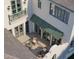 A stylish outdoor patio with wicker furniture, creating an inviting lounge space at 6151 Bayou Grande Ne Blvd, St Petersburg, FL 33703