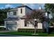 Charming two-story home with a lush green lawn and mature landscaping at 6151 Bayou Grande Ne Blvd, St Petersburg, FL 33703