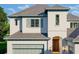 Charming facade with gray roof, light blue trim, and stylish architectural details at 6151 Bayou Grande Ne Blvd, St Petersburg, FL 33703