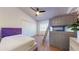 Shared bedroom with a queen-sized bed, twin bunk, and carpeted floors at 64 Pelican Pl, Belleair, FL 33756