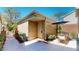 Brick exterior entrance featuring a private courtyard with outdoor seating and landscaping at 64 Pelican Pl, Belleair, FL 33756