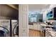 Well-appointed kitchen with modern appliances, sleek countertops, and an inviting breakfast bar perfect for casual dining at 64 Pelican Pl, Belleair, FL 33756