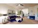 Comfortable living room with a cozy couch, stylish decor, and ample space for entertaining guests at 64 Pelican Pl, Belleair, FL 33756