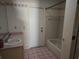 Bathroom featuring sink, toilet, bathtub/shower combo and rose-themed trim at 6473 Blackbird Ave, Weeki Wachee, FL 34613