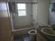 Bathroom featuring vanity, mirror, toilet and shower/tub combo at 6473 Blackbird Ave, Weeki Wachee, FL 34613
