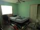 Bright bedroom featuring a window, closet, and ample space at 6473 Blackbird Ave, Weeki Wachee, FL 34613