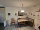 Bright breakfast nook featuring tile flooring and ample seating at 6473 Blackbird Ave, Weeki Wachee, FL 34613