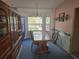 A themed dining room with view of swimming pool at 6473 Blackbird Ave, Weeki Wachee, FL 34613