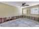 Bedroom, under renovation, with ceiling fan and plumbing ready for reconstruction at 6804 Sea Gull S Dr, St Petersburg, FL 33707