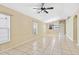 Large open living room features tile flooring and plenty of natural light at 7233 Lumber Port Dr, Ruskin, FL 33573