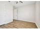 Bright bedroom showcasing an open design and hardwood floors at 8766 Shadyside Ln, Land O Lakes, FL 34637