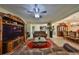 Inviting living room with an open floor plan, tile floors, and neutral paint at 10708 Planer Picket Dr, Riverview, FL 33569