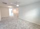 Spacious loft area with neutral carpet and recessed lighting at 10821 Windswept Garden Way, Tampa, FL 33647