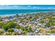 Charming coastal neighborhood with beach access and lush trees, offering a serene and picturesque setting at 119 13Th Ave, Indian Rocks Beach, FL 33785