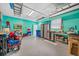 Spacious garage with ample storage and workspace, perfect for projects and organization at 119 13Th Ave, Indian Rocks Beach, FL 33785