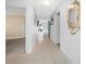 Inviting hallway featuring neutral walls, tile flooring, and decorative accents at 119 13Th Ave, Indian Rocks Beach, FL 33785