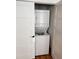 Convenient stacked washer and dryer in a closet with bifold doors at 1209 N Franklin St # F, Tampa, FL 33602