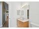 Bathroom features a single vanity sink and a toilet at 1210 Paradise Lake Dr, Tarpon Springs, FL 34689