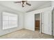 Carpeted bedroom with closet at 1210 Paradise Lake Dr, Tarpon Springs, FL 34689