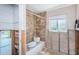 Bathroom with tub and tile walls at 1233 Eden Isle Ne Dr, St Petersburg, FL 33704