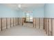 Bedroom with blue walls and one window at 1233 Eden Isle Ne Dr, St Petersburg, FL 33704