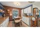 Kitchen nook displays brick accent wall and breakfast seating at 14407 Alistar Manor Dr, Wimauma, FL 33598