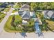 An aerial view showcases this property's well-maintained yard and screened pool area in a friendly neighborhood at 1479 Arredondo St, North Port, FL 34286