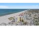 Stunning aerial view of a condo building overlooking the beach, offering breathtaking ocean views and a prime location at 15 Avalon St # 601, Clearwater Beach, FL 33767