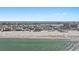 Stunning aerial view of condo on a beach with ocean views at 15 Avalon St # 601, Clearwater Beach, FL 33767