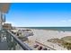 Wide balcony view of the beach, the pier, and the ocean at 15 Avalon St # 601, Clearwater Beach, FL 33767